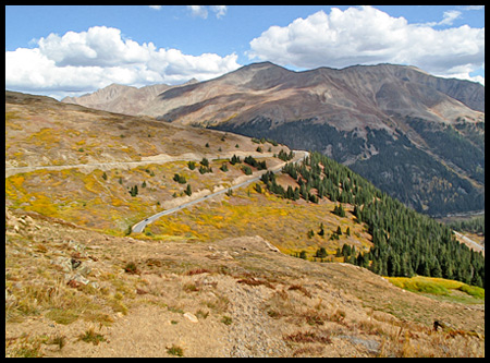 The road is narrow and steep with a 6.5% gradient, including tight switchbacks on each approach. Sections of the pass have a speed limit of 25 mph, with advisory limits on some switchbacks as low as 10 mph. 