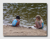 Children at the beach at the lake
